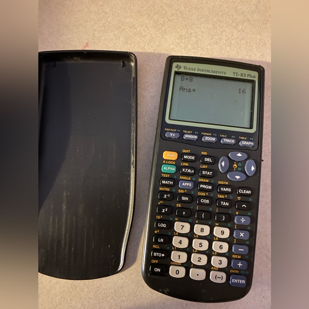 Used Texas instrument  Ti 83 plus black